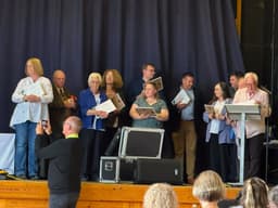 Group shot of appreciation award acceptance